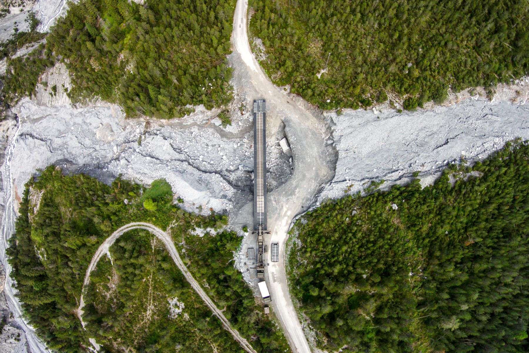 Intervention d&apos;aide en cas de catastrophe Lave torrentielle Commune de Scuol